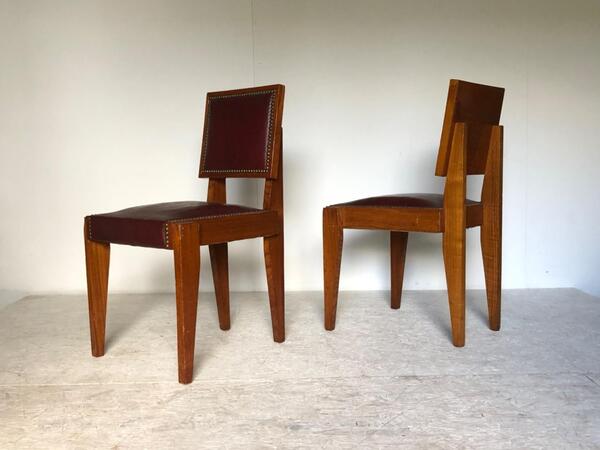 Andre Sornay ( 1902 - 2000 ) paire de chaises moderniste en acajou et cuir 