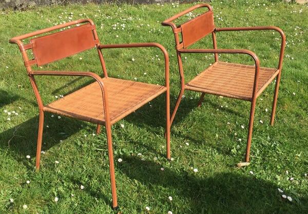 Jacques Adnet ( 1900 - 1984 ) paire de fauteuils en cuir piqué sellier et rotin vers 1950 